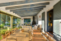 Verandah lounge, glassed in for winter to make a conservatory